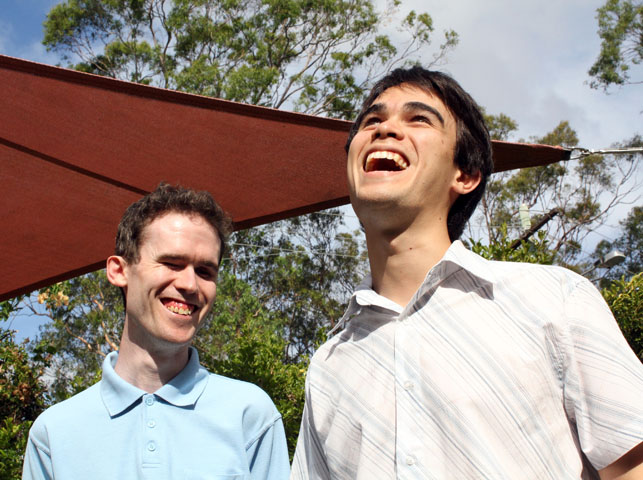 Michael Curran and James Teh outside laughing