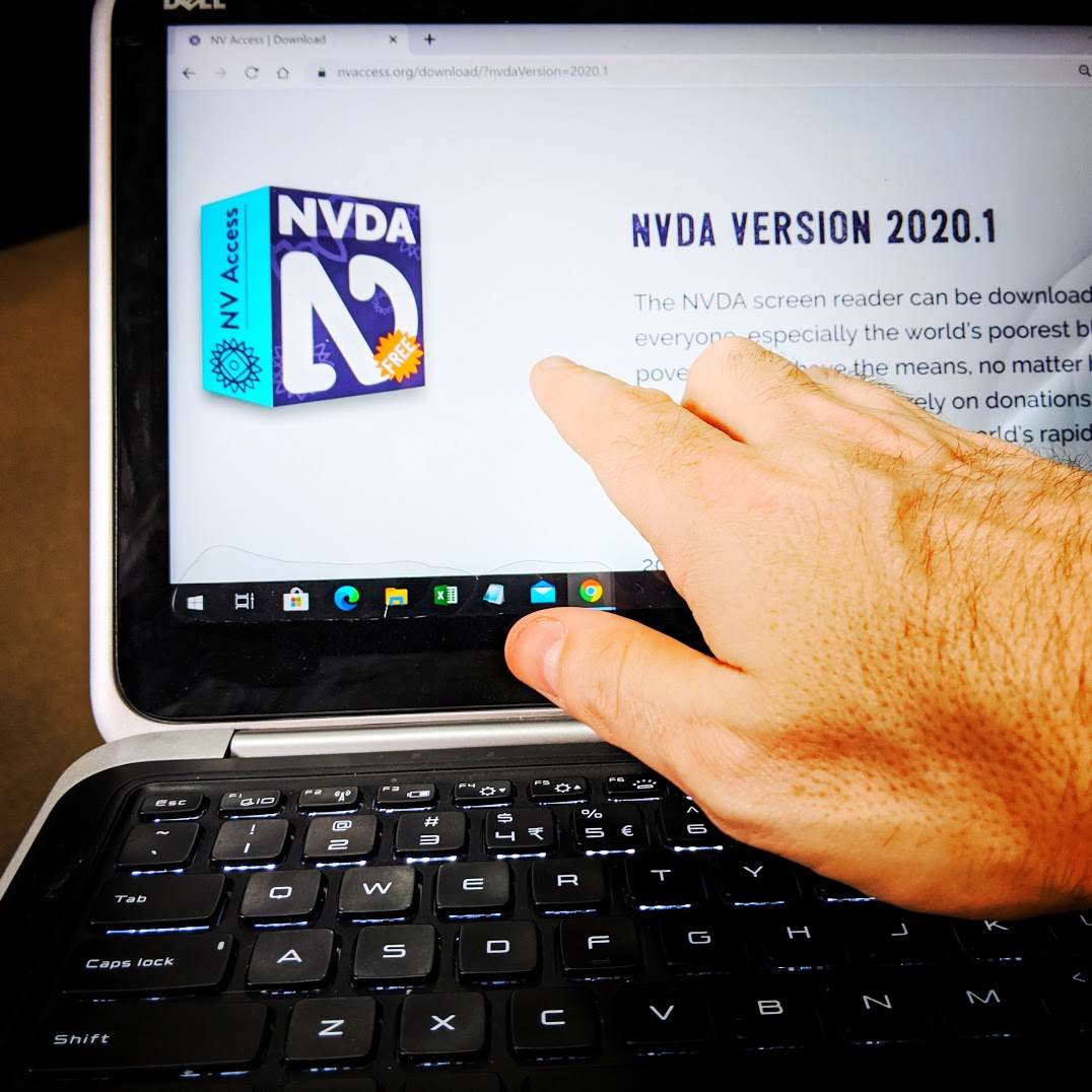 Hand reaching for laptop touch screen showing NVDA download