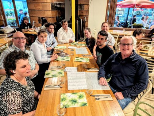 NV Access team and board members around the table for dinner