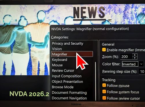 Photograph of monitor with NVDA Magnifier at 200% inverted colours and showing the magnifier settings screen with the 2026.2 release post in the background.